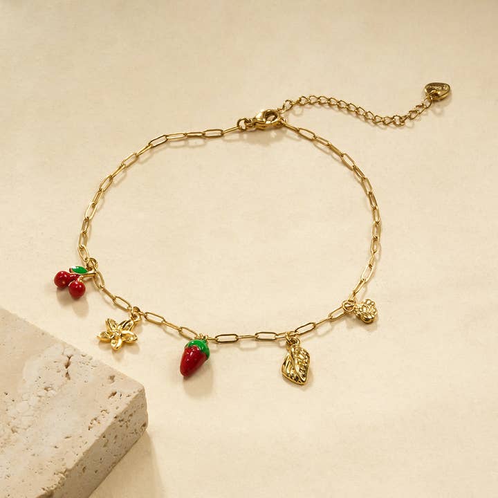 Cavigliera con 5 ciondoli fragola e ciliegia per la vendita all'ingrosso da parte di joya