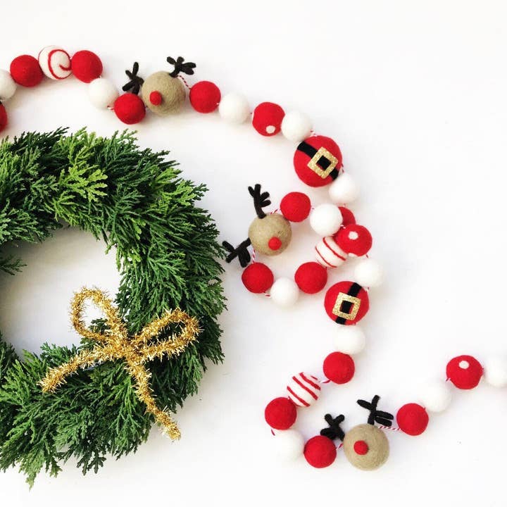 Santa's Reindeer Felt Ball Garland for wholesale by Pearl & Jane