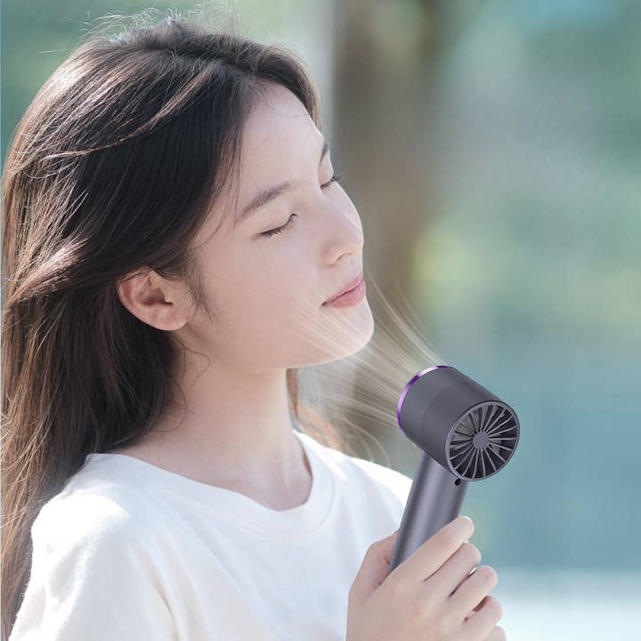 Breezio™ | Handheld Mini Fan and other Purchase Wholesale mini handheld fan. Free Returns & Net 60 Terms on Faire trending on Faire.