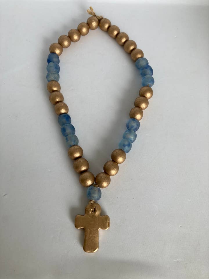 Gold Wood Beads And Blue Wave Glass Beads W/Small Clay Cross for wholesale by RKM Designs