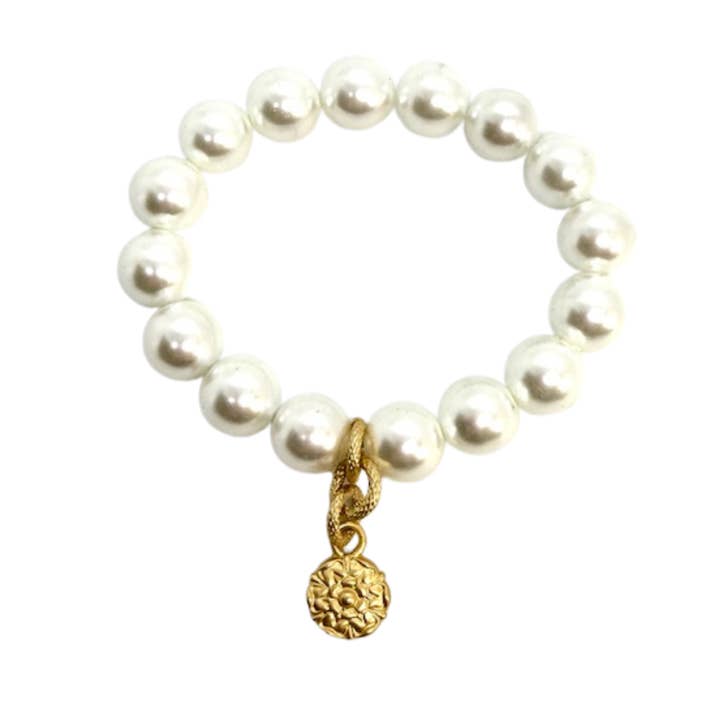White Pearl Stretch Bracelet With Matte Gold Flower Charm for wholesale by Deborah Grivas Designs