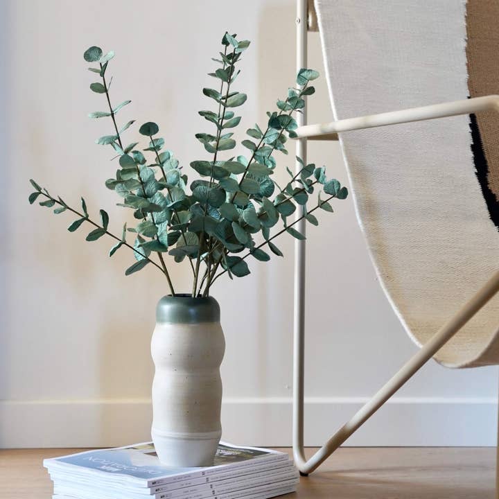 Large eucalyptus branch in green paper for wholesale by Flowrette