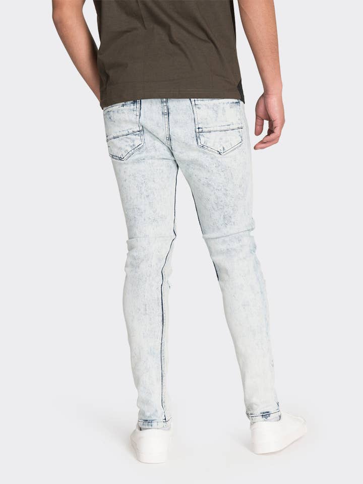 Lichtblauwe gescheurde jeans met taps toelopende crop fit voor wholesale door London Attitude