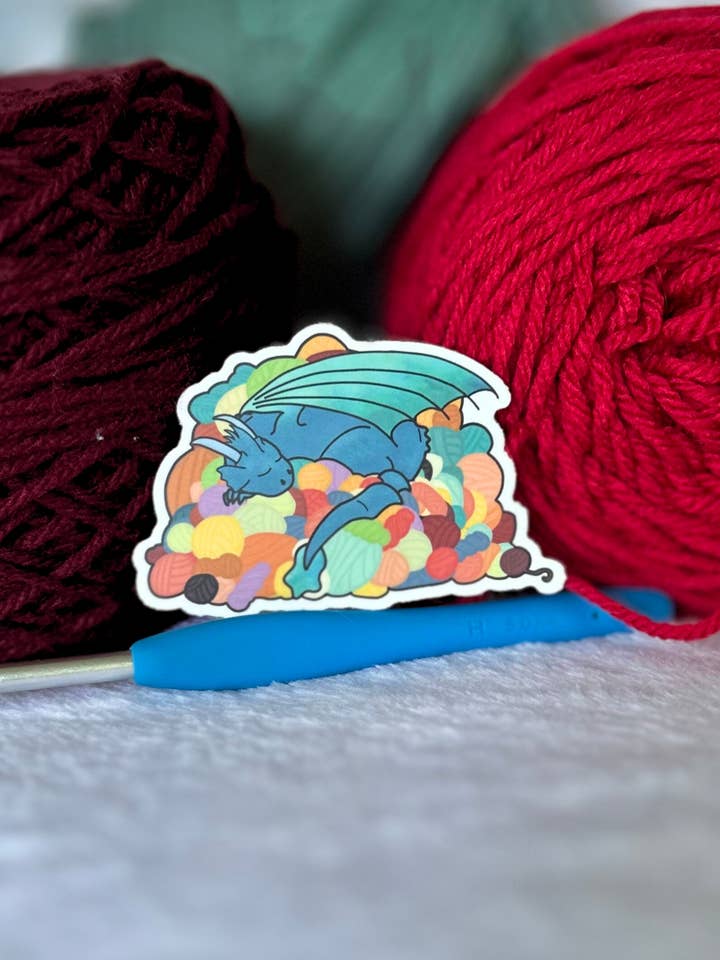 Dragon's Yarn Hoard Sticker for wholesale by The Hookshelf