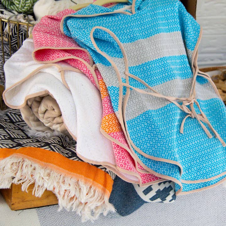 Baby Ponchos for wholesale by Marie Russel/Heartfelt Goods