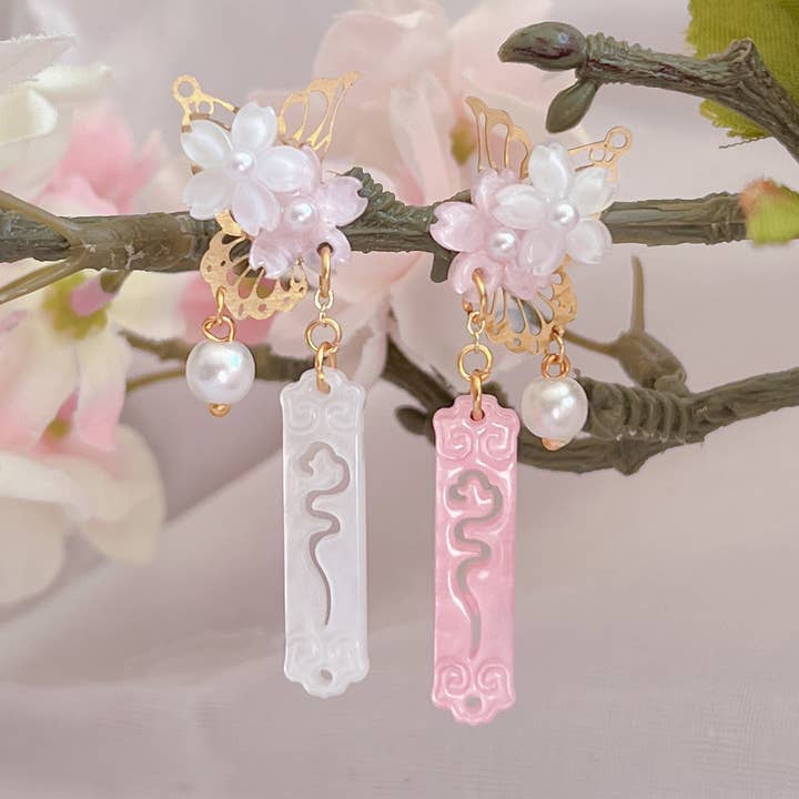 Asymmetriska sakura fjärilsörhängen för wholesale av gemsbysidney