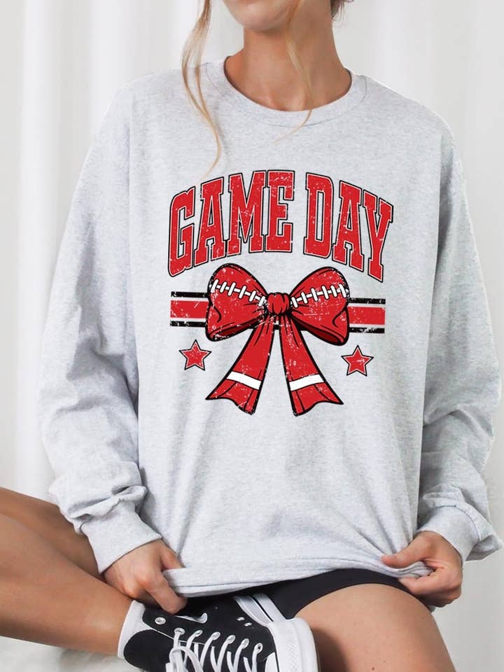 Camiseta de manga larga con gráfico de lazo de fútbol para el día del juego en rojo para venta al por mayor de Pink Irene Wholesale