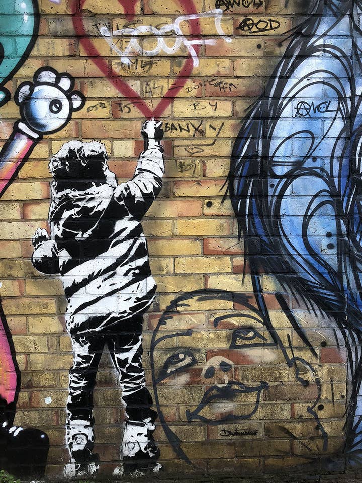 Banksy - Kid Drawing Heart for wholesale by BLUE SHAKER