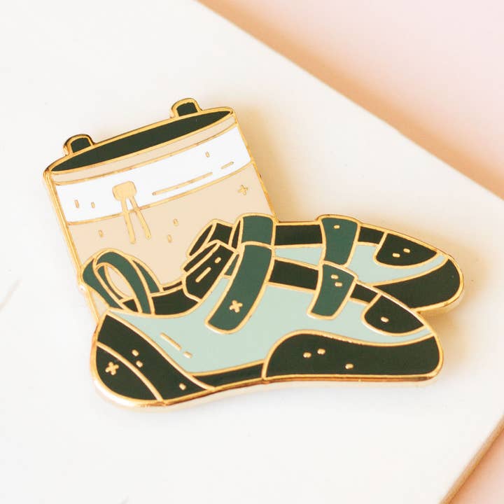 Climbing Shoes Enamel Pin for wholesale by Occasionalish