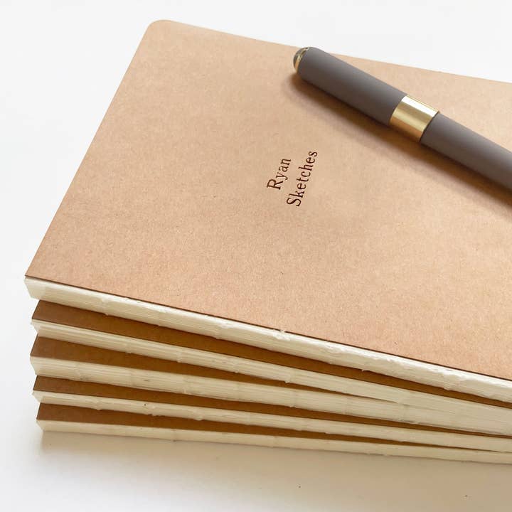 Studio Portmanteau - Wholesale Notebook - Custom Text Foil Embossed Lay Flat, Exposed Binding Notebook