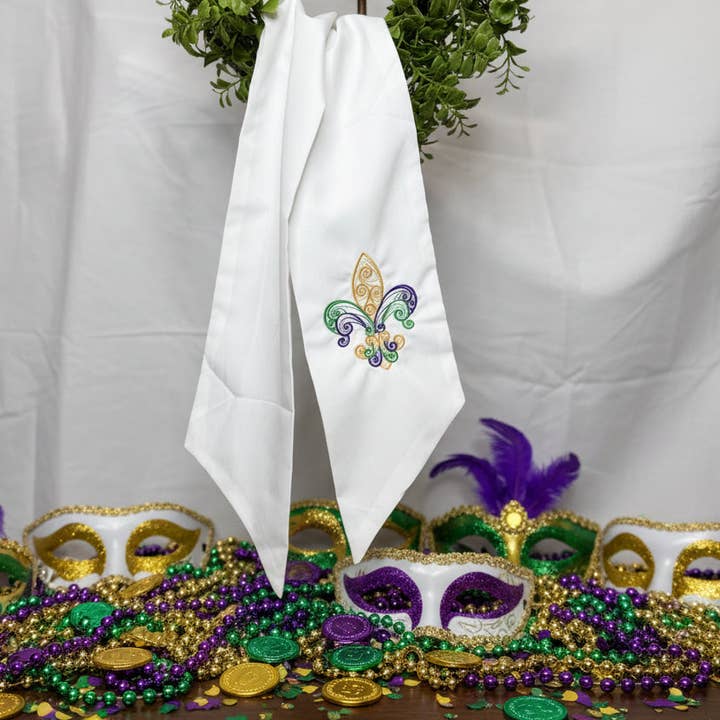 Mardi Gras Wreath Sash | Fleur De Lis Lace for wholesale by Oh Stitch, Please LLC