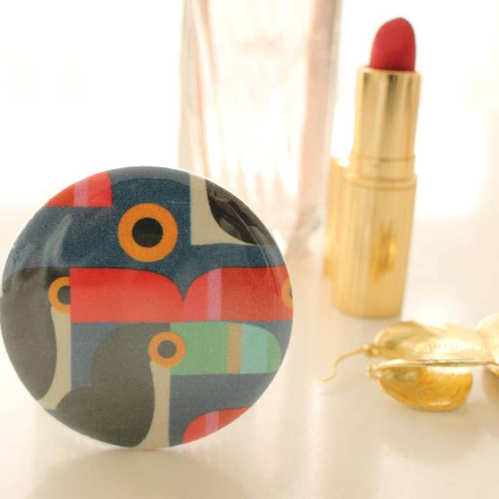 Bella red toucan pocket mirror for wholesale by Sabrina Trefle