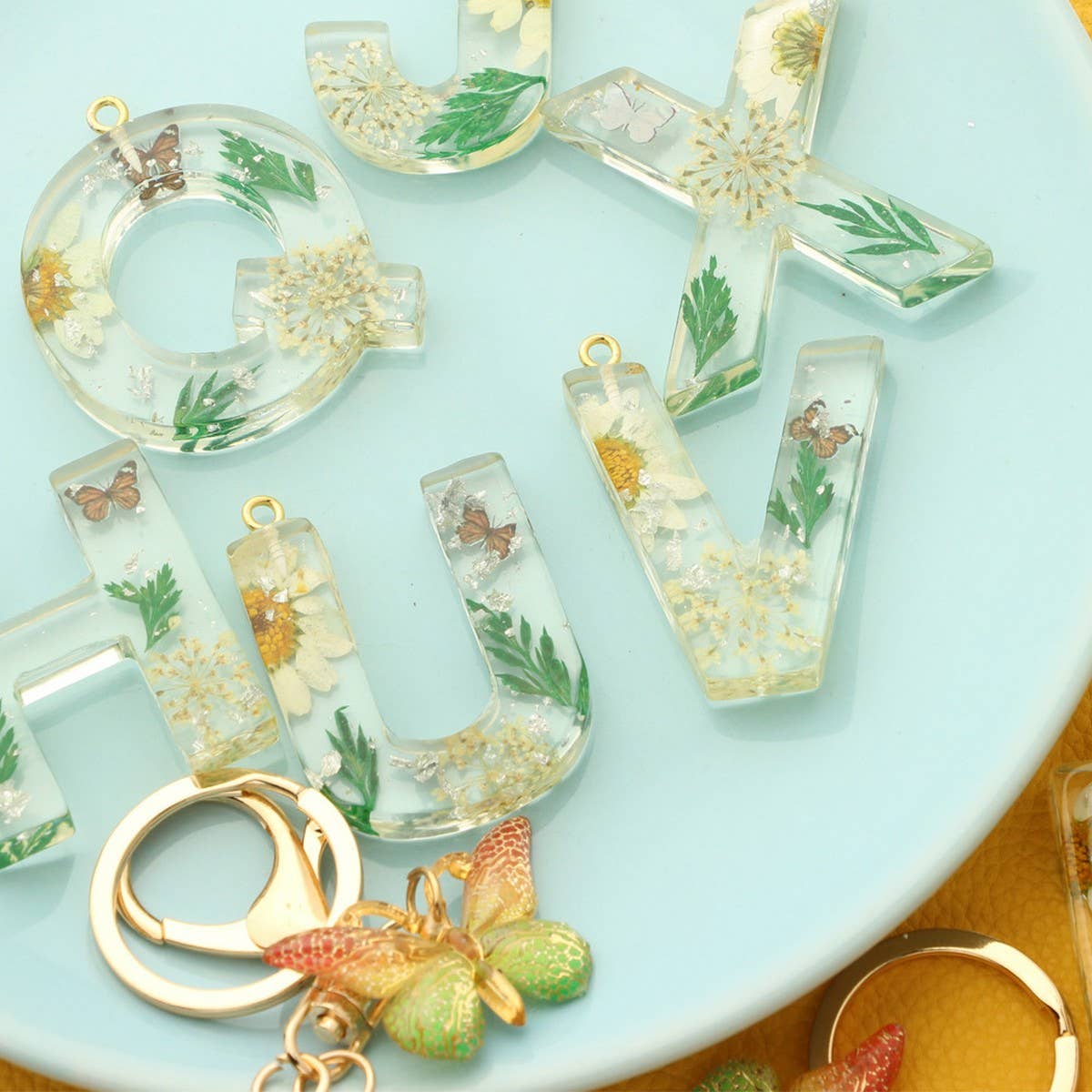 ACCITY - Wholesale Keychain - Women's - Flower Letter Keychain with Yellow Butterfly Charm_CWAB509026