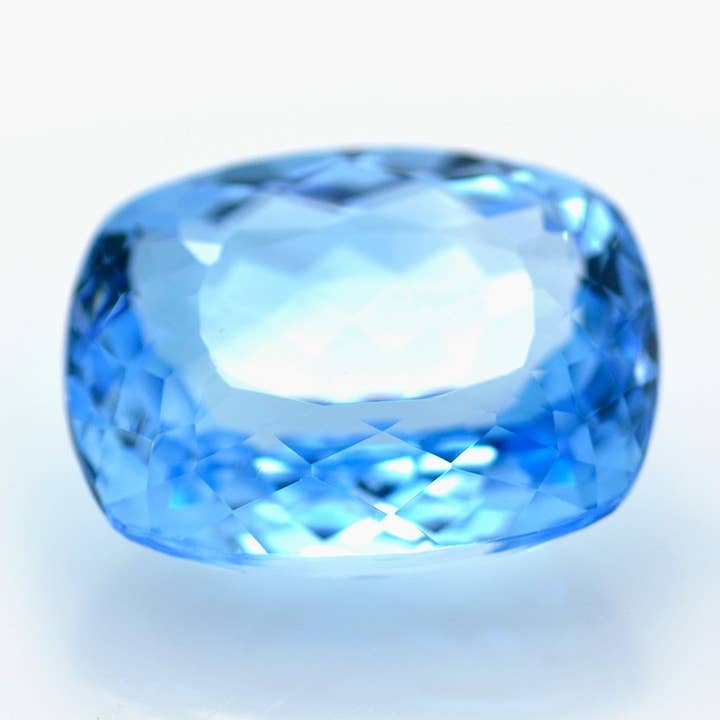Topázio Azul Corte Almofada 32,66 ct por atacado de Naturjoya
