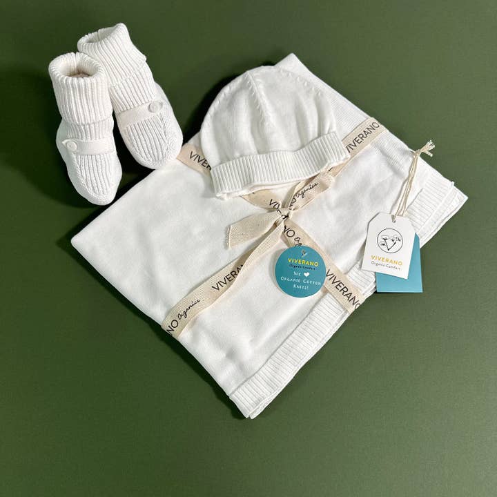Dove White Baby Blanket Sweater Knit (Organic Cotton) for wholesale on Faire
