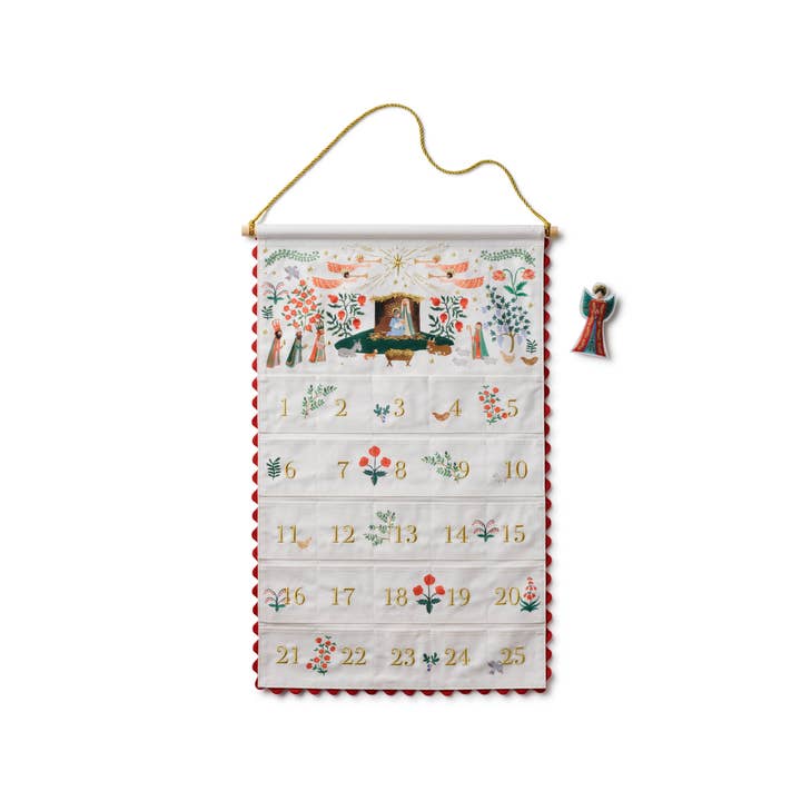 Calendrier de l'avent suspendu brodé sur le thème de la Nativité pour la vente par Rifle Paper Co