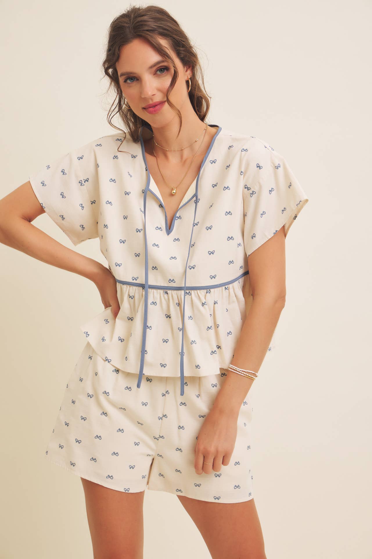 in february - Wholesale Blouse - Women's - SUNNY DAYS BOW PRINT BABYDOLL BLOUSE WITH CONTRAST BINDING0