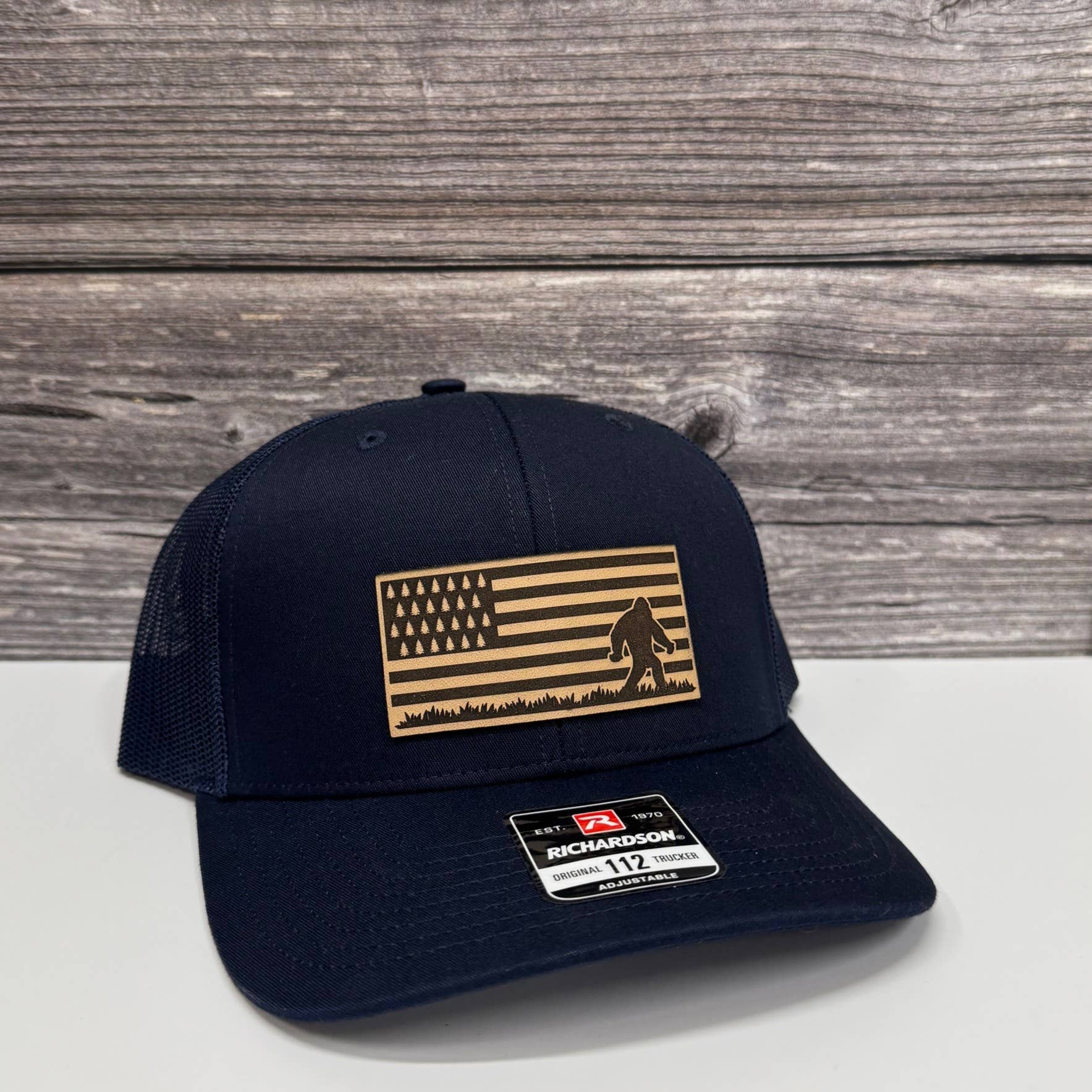 208 Tees - Wholesale Trucker Hat - Unisex - Bigfoot Forest Flag Leather Patch Hat - American Flag Design3