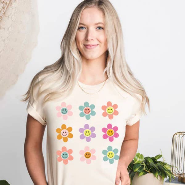 T-shirt gráfica de margaridas sorridas. por atacado de The Intentional Shop