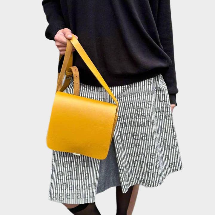 Unisex liten läderbudväska - gul för wholesale av Artisan Stories