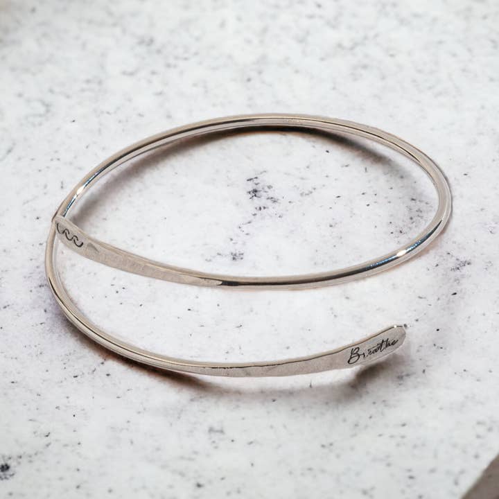 Sale - Breathe Engraved Adjustable Bangle Bracelet for wholesale by Howard's
