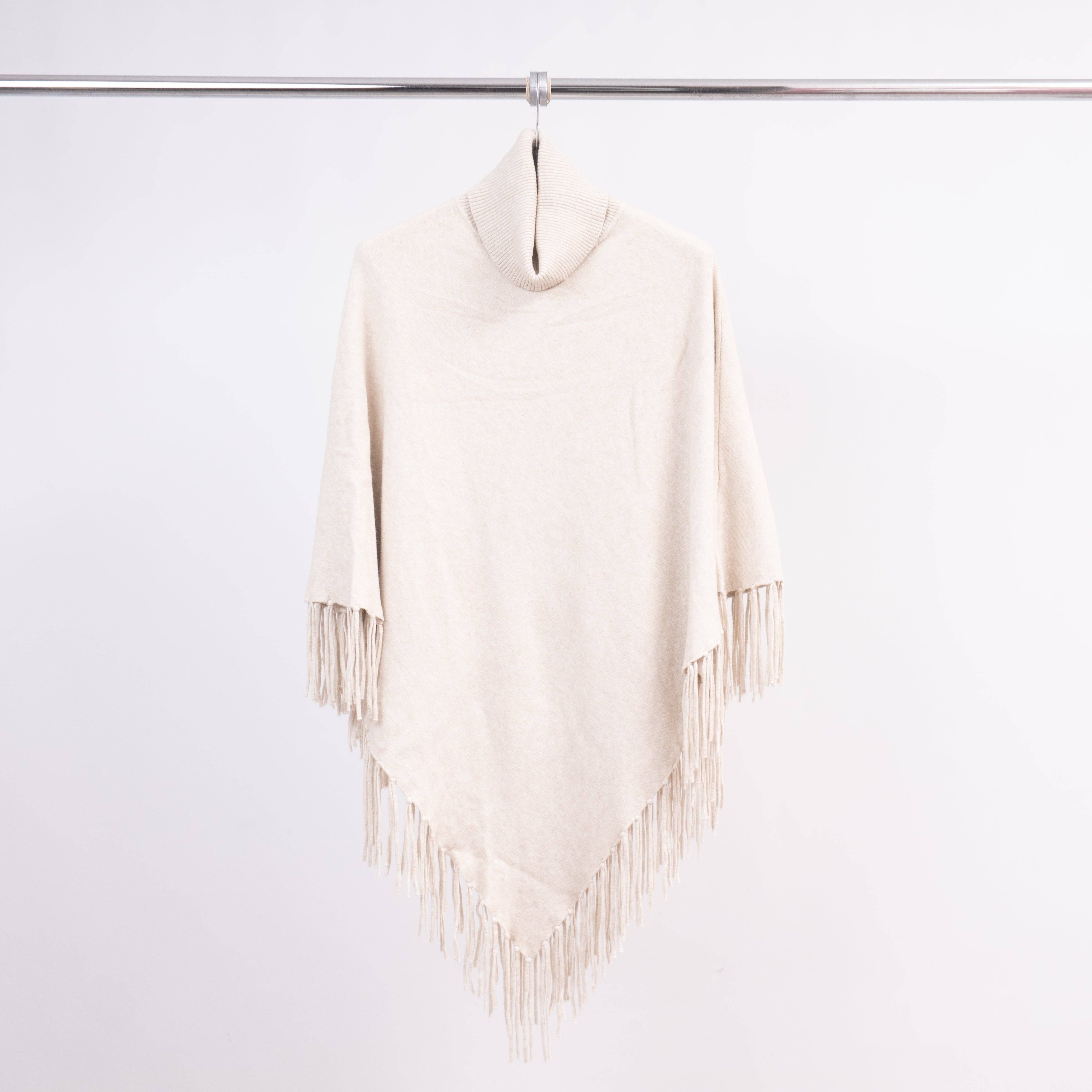Cecile Wang – wholesale Poncho – Women's – Turtleneck poncho with fringes in soft knit – DSY90853