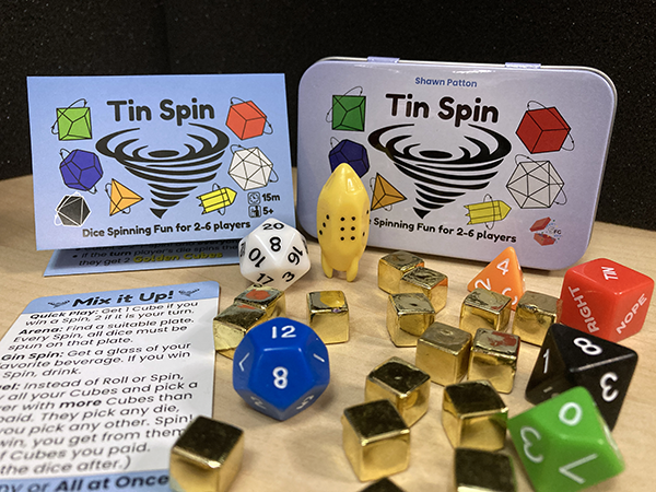 Surprisingly Fun Games – Großhandel Brettspiele – Tin Spin - Ein Geschicklichkeitsspiel mit Würfeln für 2-6 Spieler0