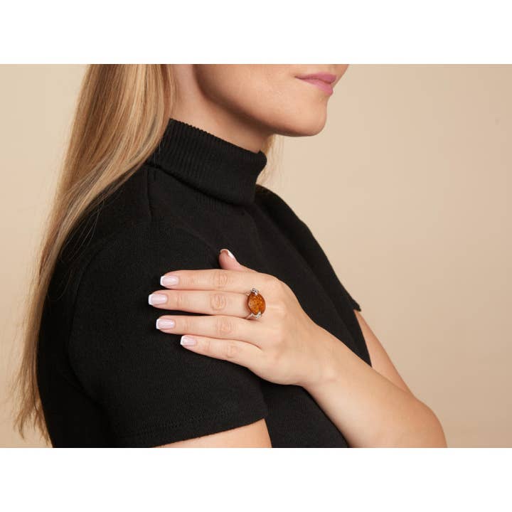 Large round stone ring with round cognac amber, sterling silver for wholesale on Faire2