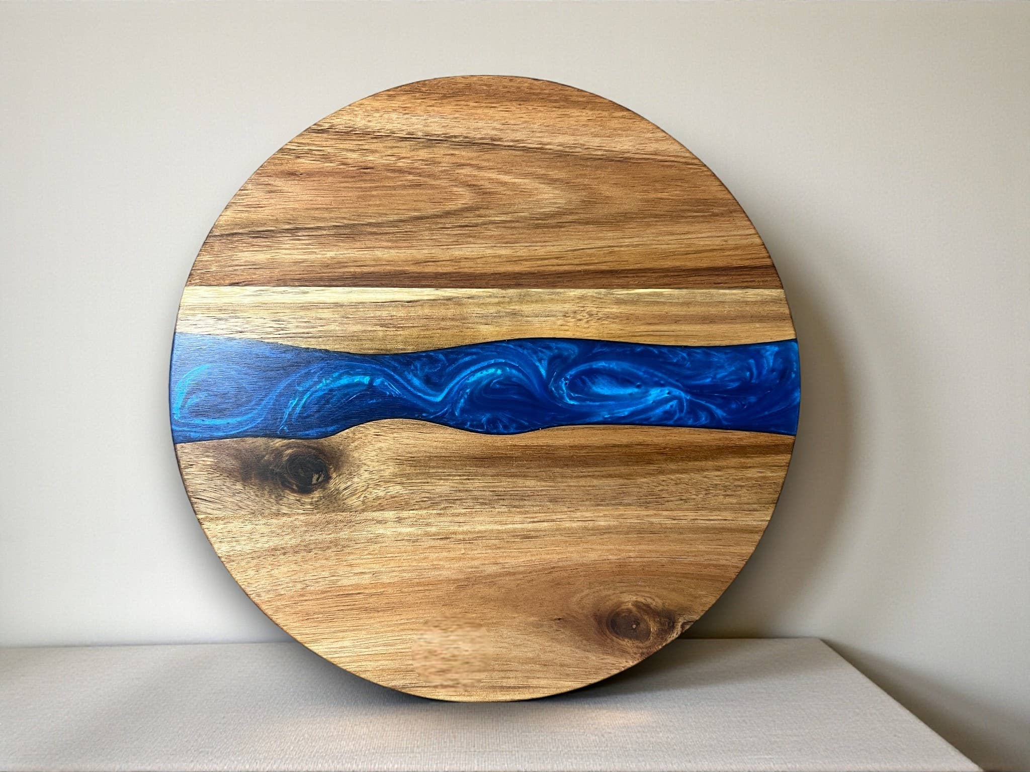 Nikita Fine Art LLC – wholesale Cheese board – Small Round  Resin River acacia cheese board0