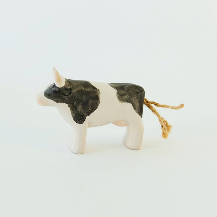 Wooden Painted Cow for wholesale by Sarah’s Silks