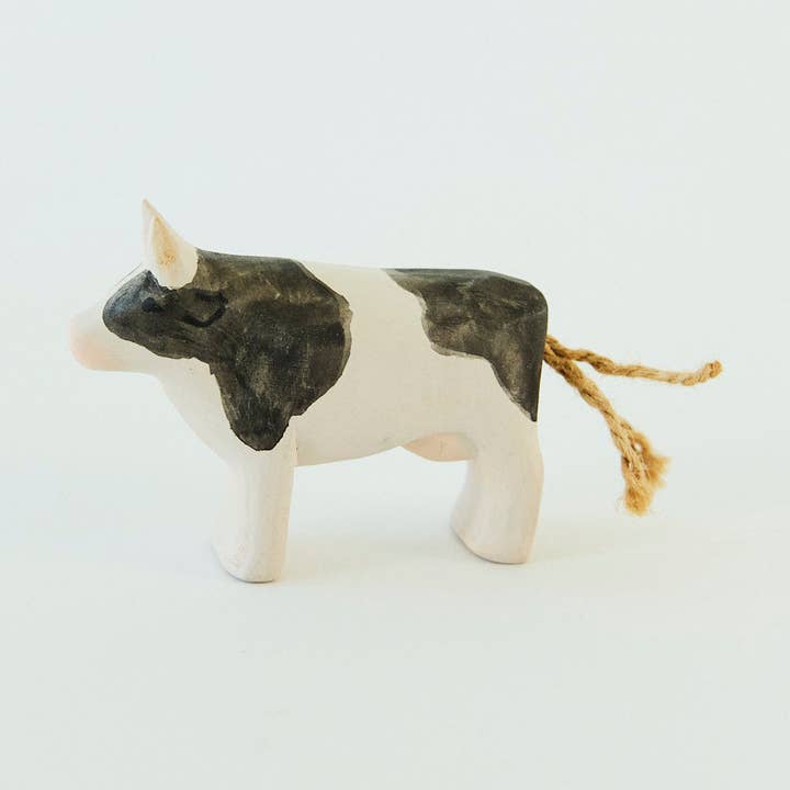 Wooden Painted Cow for wholesale by Sarah’s Silks