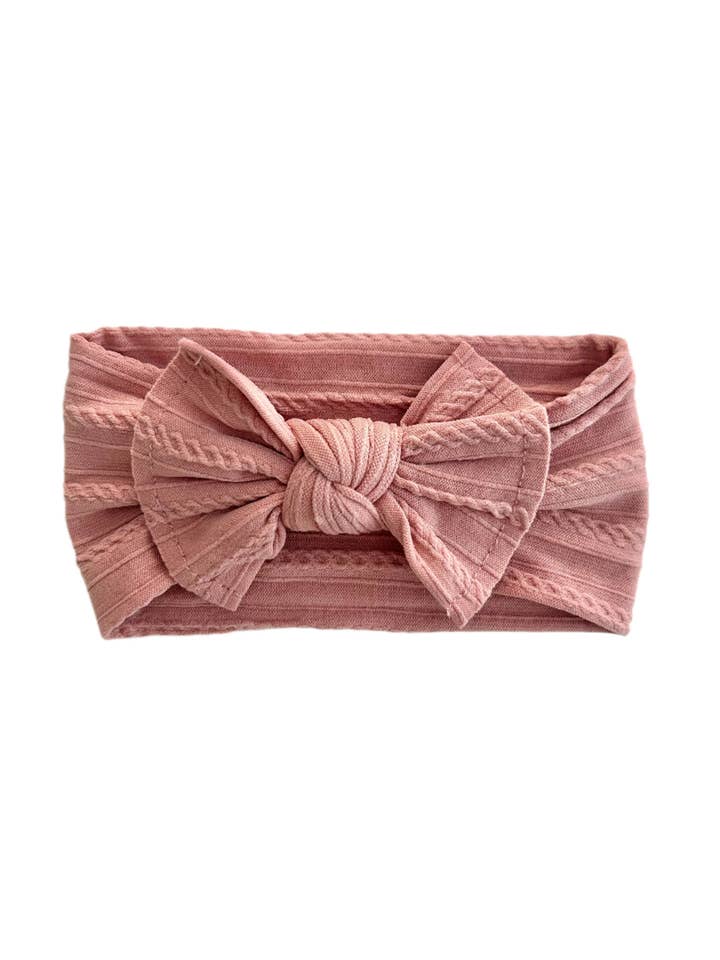Bandeau nœud rose poudré pour la vente par Celebrate Your Tribe