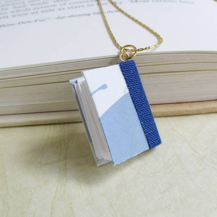 Blue Wings Book Pendant- Gold for wholesale by Nicolette Tallmadge Designs