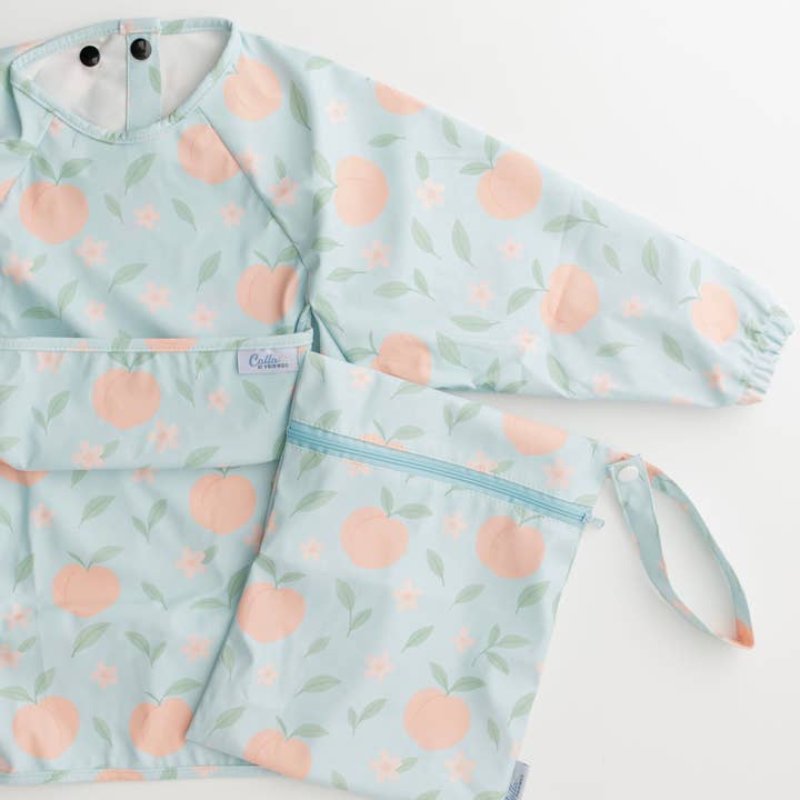 The Grayson Long Sleeve Bib - Peach Blossom for wholesale by Calla & Friends