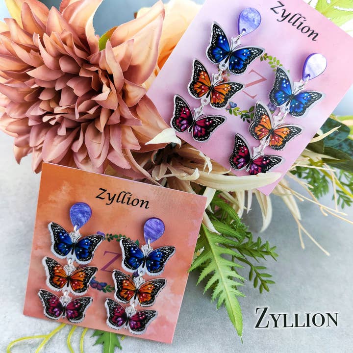 Zyllion - Wholesale Dangle earrings - Chain of Butterfly Light Weight Acrylic Dangle Sterling Silver Earrings