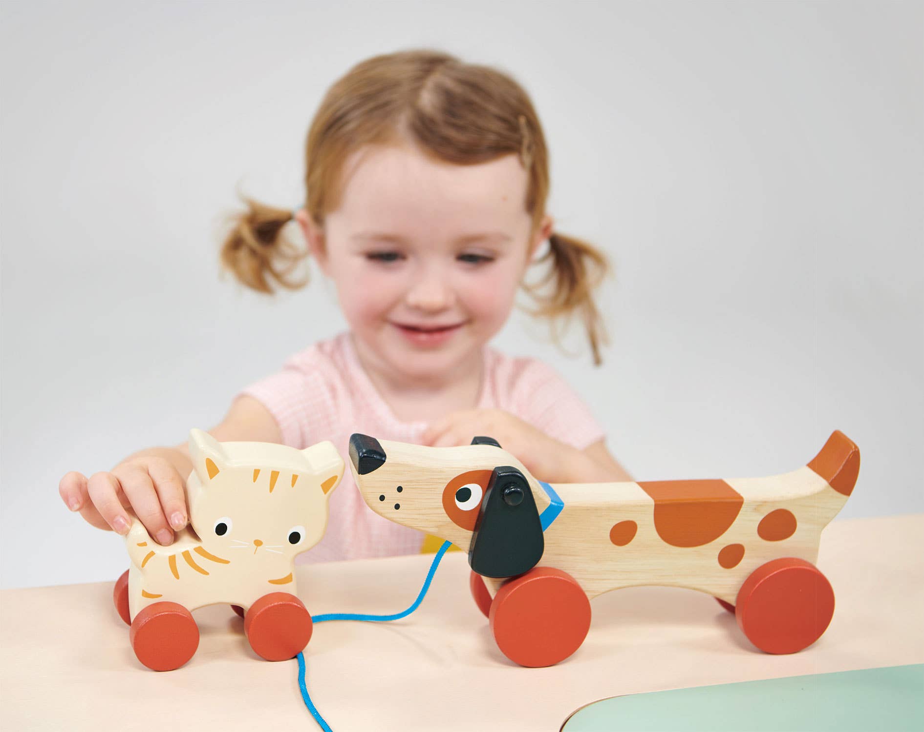 ThreadBear Design UK/EU – wholesale Wood toy – Child – Mentari Puppy On Wheels1