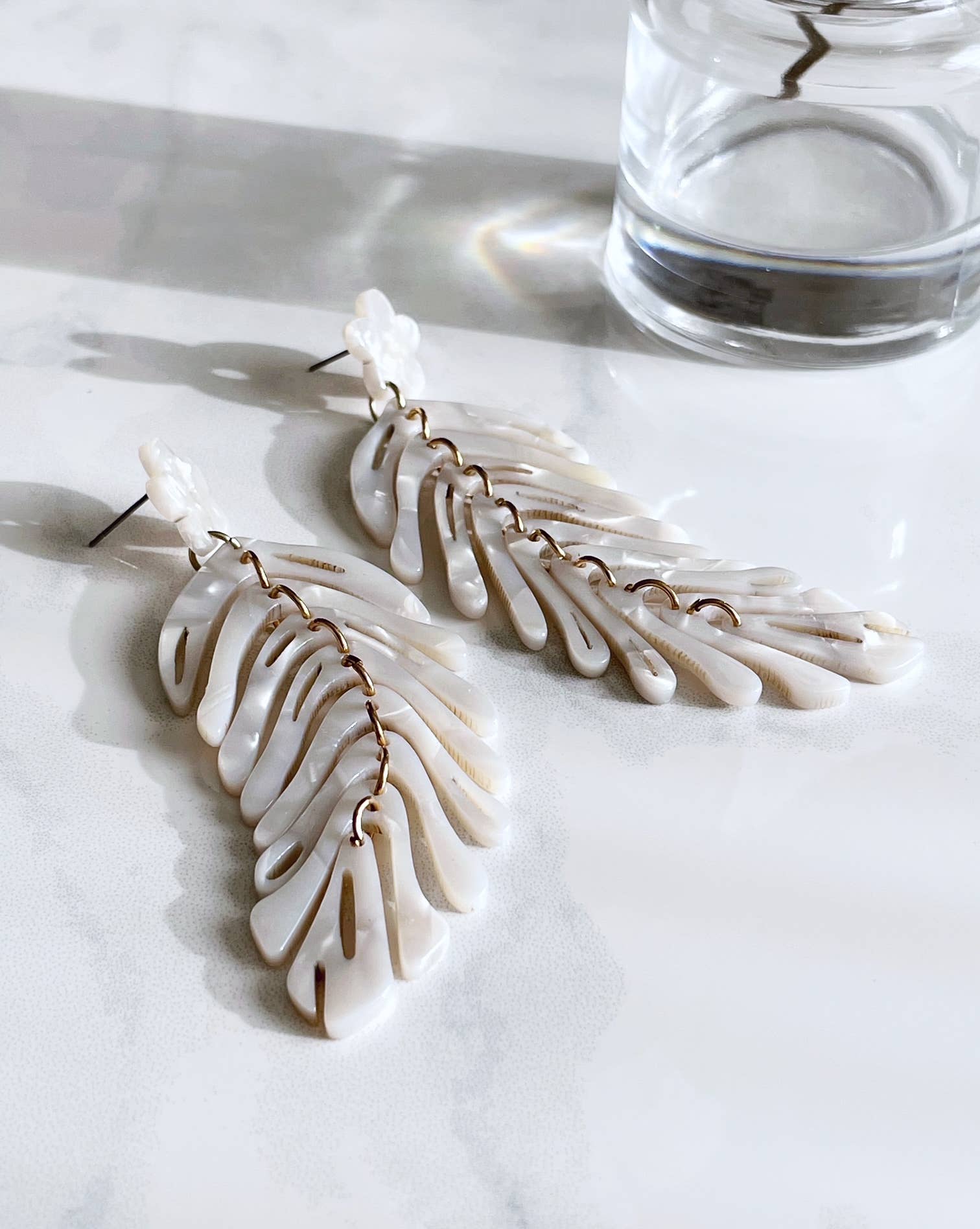 Pearl and Ivy Studio - Wholesale Dangle Earrings - Boho statement dangle earrings - feather frost4