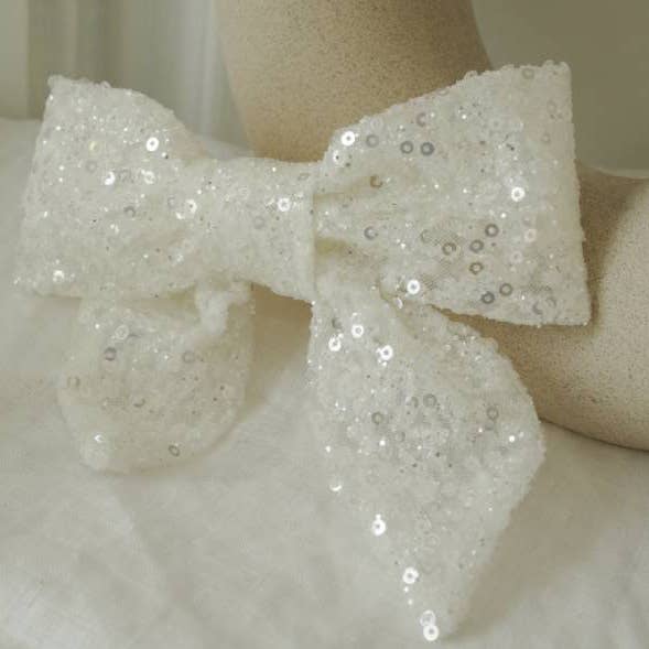 Lovely White Sequin Bow Barrette for wholesale by Bohomane