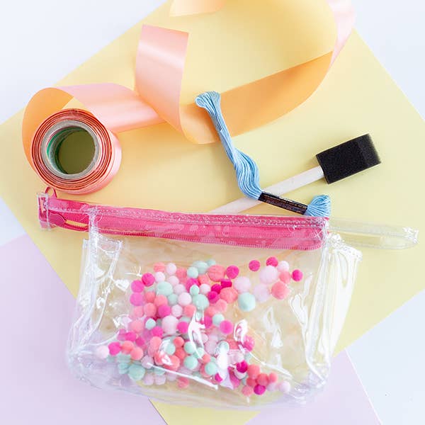 Jetsetter Pom Poms (great for holiday + valentines) for wholesale by Talking Out of Turn