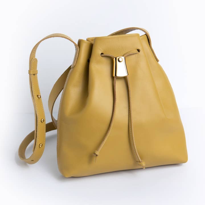 Darlene Senffarbener Kordelzug aus Leder mit Metallverschluss für den Großhandel von Viva Bags of California