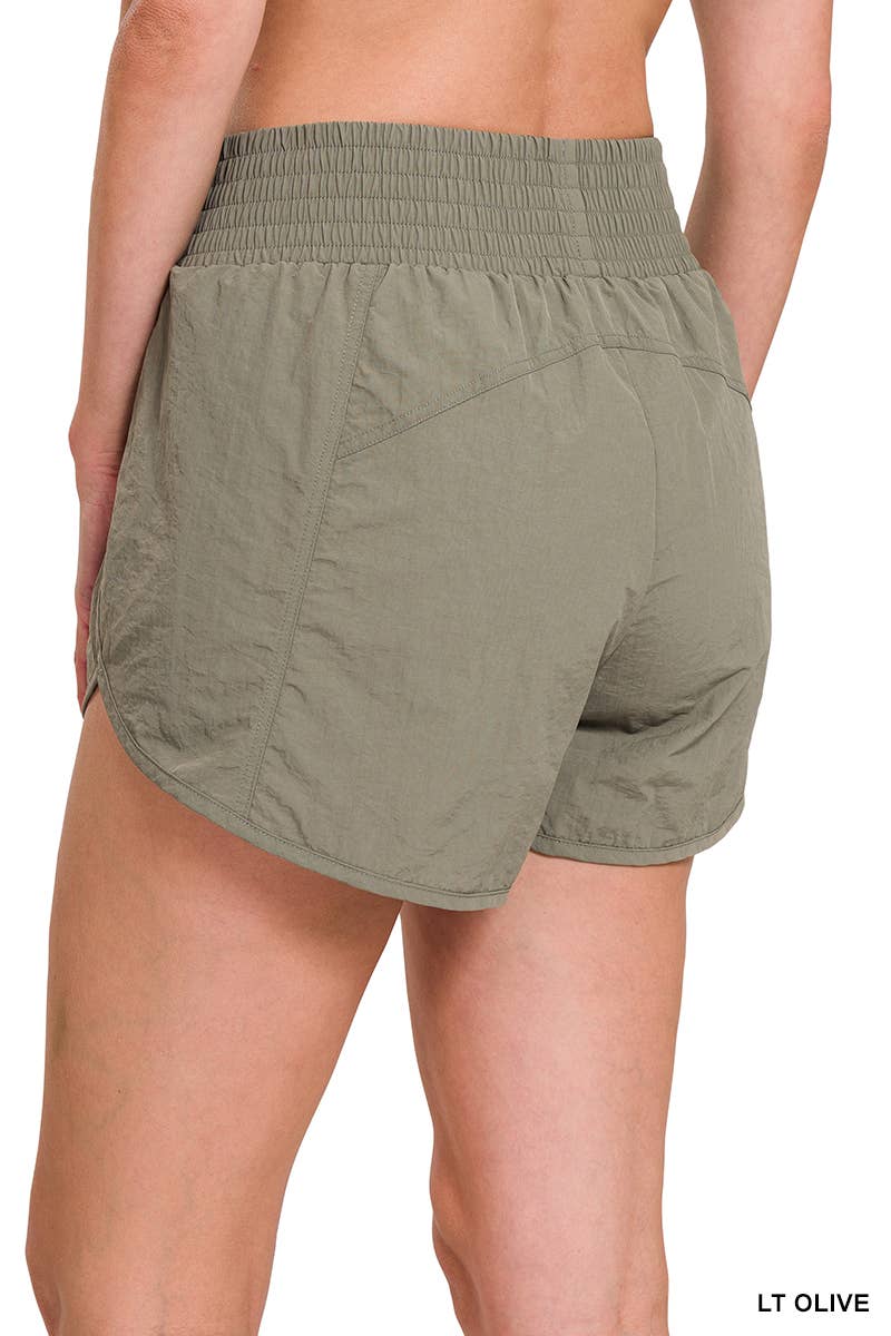 42POPS - Vendita all'ingrosso Pantaloncini sportivi - Donna - Shorts da corsa Windbreaker con vita arricciata e tasche7