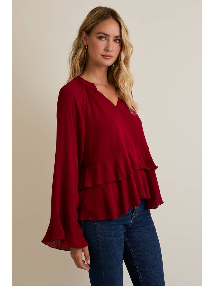 RUBIS Haut à manches longues avec encolure en V et ourlet à volants en vente sur Faire1