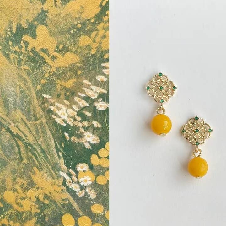 Bernstein-Tropfenohrringe: Palast-inspirierte Zirkonia-Silberstecker für den Großhandel von Otterware