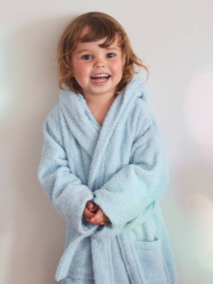 Albornoz con barco en azul claro para venta al por mayor de Liliput