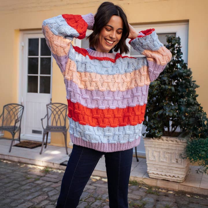 Cara & The Sky – wholesale Knitted jumper – Women′s – Mandy Criss-Cross Stitch Balloon Sleeve Stripe Jumper - Orange1