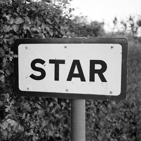 Star - Biglietto di auguri per la vendita all'ingrosso da parte di Lesser Spotted Images Ltd