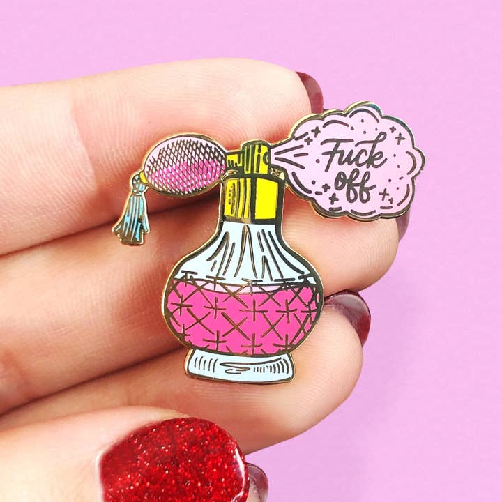 Pin's émaillé de flacon vaporisateur de parfum "Fuck Off" pour la vente par A Fink & Ink