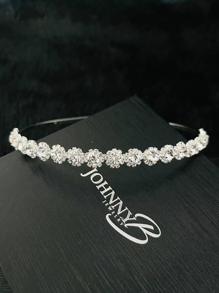 BESSIE - SIMPLE FLORAL CRYSTAL TIARA IN SILVER for wholesale by JohnnyB Jewelry