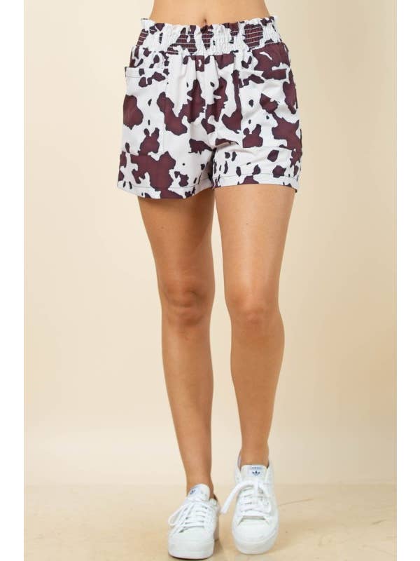 Brown Cream AP1312-MARGOT COW PRINT SMOCK ELASTIC WAIST WOVEN SHORTS for wholesale on Faire4