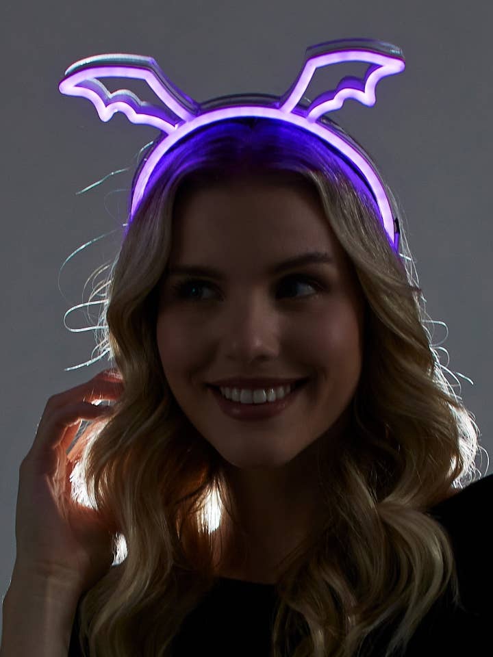 KBW Global Corp. – wholesale Pannband - Unisex – Lysande lila fladdermusvingar hårband0